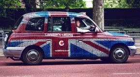 picture of a London Cab wrapped in a Union Jack paint