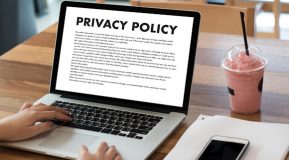 Image of a laptop computer screen showing a Privacy Policy page -