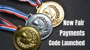 Image shows black ground with white text Fair Payments Code Launched - 3 medals with ribbons - image source Freepik premium