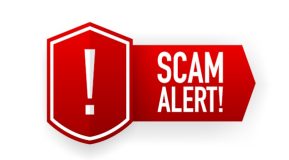 Red banner with white text Scam Alert in capital letters - image Freepik premium